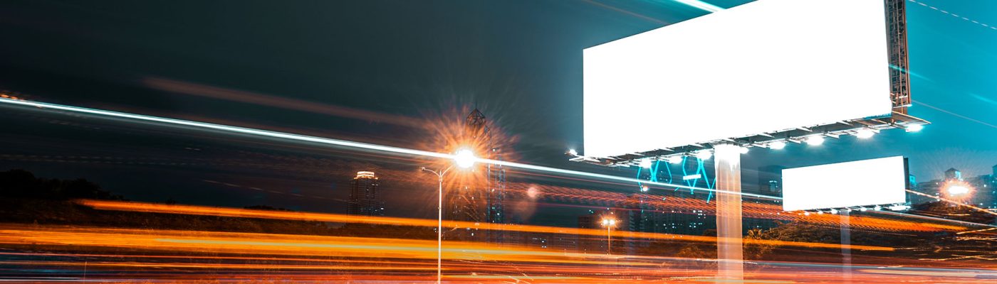 large billboards near the highway transportation hub
